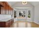 Bright kitchen with breakfast nook and custom cabinets at 4974 Dovecote Trl, Suwanee, GA 30024