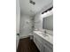 Updated bathroom with marble shower and vanity at 114 Jousters Ln, Lawrenceville, GA 30044