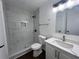 Updated bathroom, featuring a walk-in shower and quartz vanity at 114 Jousters Ln, Lawrenceville, GA 30044
