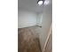 Simple bedroom with neutral walls and carpeted floors at 114 Jousters Ln, Lawrenceville, GA 30044