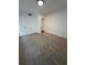 Spacious bedroom with neutral walls and carpeted floors at 114 Jousters Ln, Lawrenceville, GA 30044