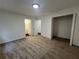 Bright bedroom featuring carpet, a large closet, and access to a full bathroom at 114 Jousters Ln, Lawrenceville, GA 30044