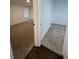 Two bedrooms with neutral carpeting and good natural light at 114 Jousters Ln, Lawrenceville, GA 30044