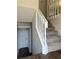 Stairs leading to the second floor from the foyer at 114 Jousters Ln, Lawrenceville, GA 30044