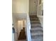 View of the entryway from upstairs, looking down at 114 Jousters Ln, Lawrenceville, GA 30044