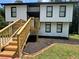 Two-story house with stylish black and white exterior at 114 Jousters Ln, Lawrenceville, GA 30044