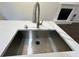 Modern kitchen sink and faucet with quartz countertop at 114 Jousters Ln, Lawrenceville, GA 30044
