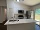 Modern kitchen with stainless steel appliances and quartz countertops at 114 Jousters Ln, Lawrenceville, GA 30044