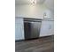 Stainless steel dishwasher installed in white kitchen cabinets at 114 Jousters Ln, Lawrenceville, GA 30044