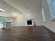 Spacious living room featuring a fireplace and hardwood floors at 114 Jousters Ln, Lawrenceville, GA 30044