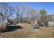 Fenced backyard with patio furniture and a grill at 3170 New Macland Rd, Powder Springs, GA 30127