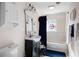 Bathroom with a tub, vanity, and stained-glass window at 3170 New Macland Rd, Powder Springs, GA 30127