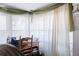 Bedroom with corner window and a wooden desk at 3170 New Macland Rd, Powder Springs, GA 30127