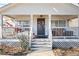 Inviting front porch with a swing and decorative accents at 3170 New Macland Rd, Powder Springs, GA 30127
