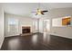 Spacious living room with dark hardwood floors, fireplace, and vaulted ceiling at 613 Montview Sw Ct, Marietta, GA 30060