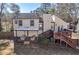 Aerial view of the home, featuring a spacious backyard with a covered patio at 1775 Jody Ne Dr, Marietta, GA 30066
