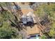 The home is surrounded by trees and has a large, fenced-in backyard with a patio at 1775 Jody Ne Dr, Marietta, GA 30066