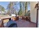 View of wood deck with brown railings offering views of a wooden fence-enclosed backyard at 1775 Jody Ne Dr, Marietta, GA 30066