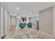 Finished basement with seating area, neutral colored rug and paint with access to stairs and backyard at 1775 Jody Ne Dr, Marietta, GA 30066