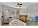 Cozy Bedroom featuring wood floors, soft lighting, and neutral decor at 1775 Jody Ne Dr, Marietta, GA 30066