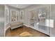 Breakfast nook featuring a bench seat, hardwood floors, and views to backyard at 1775 Jody Ne Dr, Marietta, GA 30066