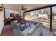 View of covered patio with seating area and view of a fenced-in backyard at 1775 Jody Ne Dr, Marietta, GA 30066