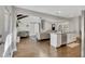 Open concept living area featuring an island with granite countertops, and fireplace with TV at 1775 Jody Ne Dr, Marietta, GA 30066