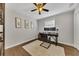 Modern home office with hardwood floors, area rug and large windows at 1775 Jody Ne Dr, Marietta, GA 30066