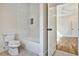 Bathroom with shower/tub combo and hardwood floor at 2179 William Way, Atlanta, GA 30345