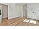 Light-filled bedroom featuring hardwood floors and built-in closet at 2179 William Way, Atlanta, GA 30345