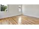 Bright bedroom with hardwood floors and two windows at 2179 William Way, Atlanta, GA 30345