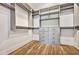 Large walk-in closet with shelves and hanging rods at 2179 William Way, Atlanta, GA 30345