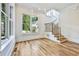 Spacious dining area with hardwood floors and a stunning chandelier at 2179 William Way, Atlanta, GA 30345