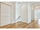 Bright hallway with hardwood floors and access to bedrooms at 2179 William Way, Atlanta, GA 30345