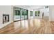 Hardwood floors, fireplace, and sliding glass doors to screened porch at 2179 William Way, Atlanta, GA 30345