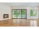 Living room with hardwood floors, fireplace and sliding doors to deck at 2179 William Way, Atlanta, GA 30345