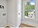 Bright hallway with wood floors, a door, and a view at 2179 William Way, Atlanta, GA 30345