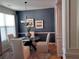 Dining room with a chandelier and blue accent wall at 3144 Spicy Cedar Ln, Lithonia, GA 30038