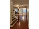 Hardwood floors and a staircase welcome you to the home at 3144 Spicy Cedar Ln, Lithonia, GA 30038