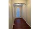 Bright foyer with hardwood floors and an arched entryway at 3144 Spicy Cedar Ln, Lithonia, GA 30038