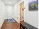 Bright entryway with hardwood floors, bench, and half bath at 845 Spring Nw St # 429, Atlanta, GA 30308