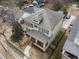 Aerial view of a two-story house and surrounding neighborhood at 2616 Highland Se Ave, Smyrna, GA 30080