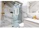 Elegant bathroom with marble shower and gold fixtures at 3000 Leeds Garden Ln, Alpharetta, GA 30022