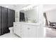 Clean bathroom with white vanity and double sinks at 3000 Leeds Garden Ln, Alpharetta, GA 30022