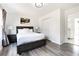 Spacious bedroom with a king-size bed and ensuite bathroom at 3000 Leeds Garden Ln, Alpharetta, GA 30022