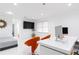 Bright home office features built-in workspace and stylish furniture at 3000 Leeds Garden Ln, Alpharetta, GA 30022