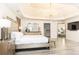 Spacious main bedroom with large bed and walk-in closet at 3000 Leeds Garden Ln, Alpharetta, GA 30022