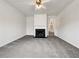 Living room with fireplace and neutral carpeting at 4 Brookvalley W Ct, Dallas, GA 30157