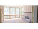 Screened porch with wood floors, brick fireplace, and lots of windows to capture natural light and views at 4515 Aiden Way, Cumming, GA 30041