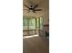 Covered porch features a wood burning fireplace and screened windows for a tranquil view at 4515 Aiden Way, Cumming, GA 30041